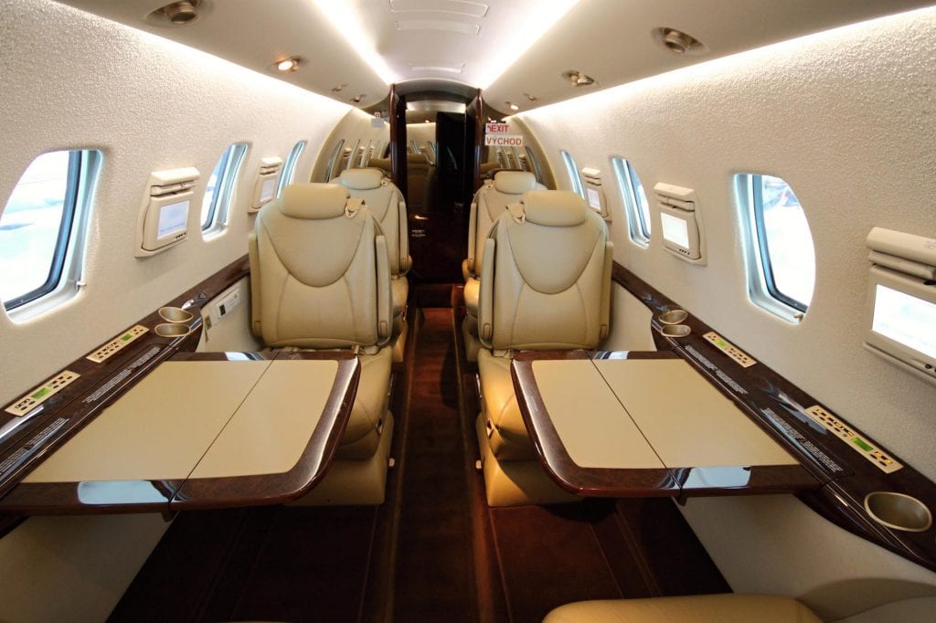 Stand up aircraft cabin with open tables