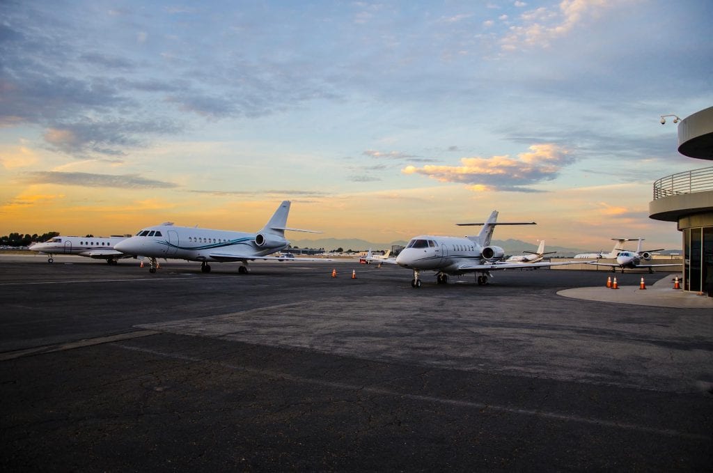 Jets on runway at sundown